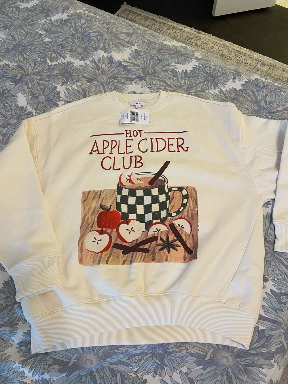 next Cream Crewneck Sweatshirt with Apple Cider Graphic